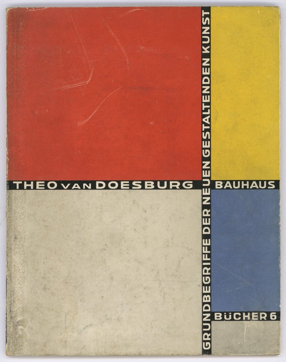 Buchcover mit bunten geometrischen Farben in Rot, Gelb, Blau und Weiß, Titel in schwarzer Schrift.