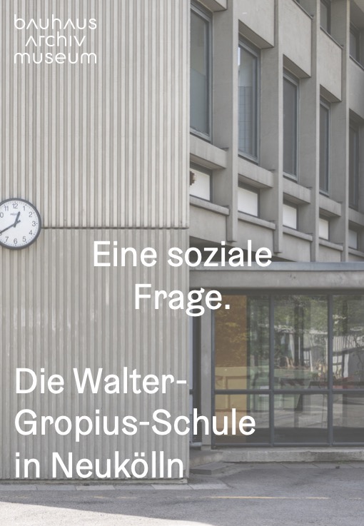 View of the Walter Gropius School in Neukölln with a clock and the inscription "A social question."